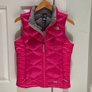 Girls pink with gray lining down vest. The North Face